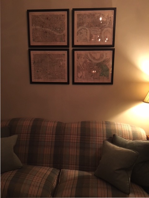 hanging pictures over couch